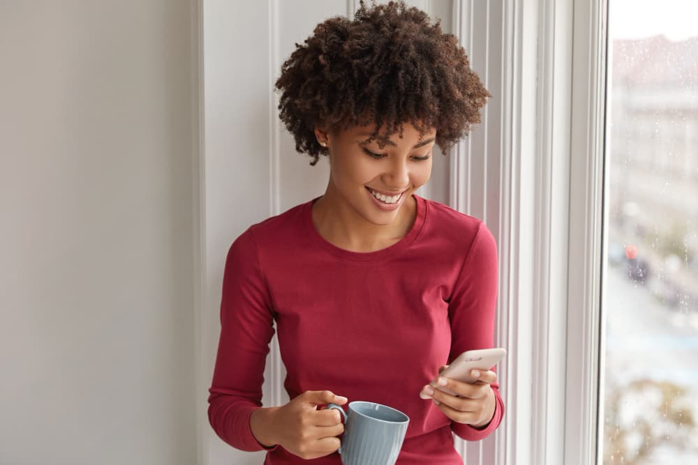 Woman reading a message on her phone